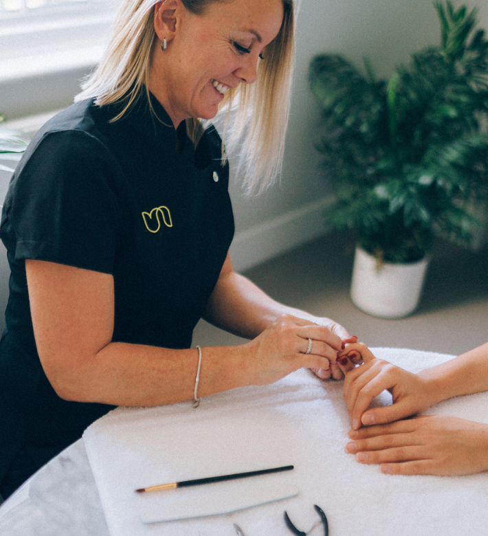 Urban nail pro at work in client's home