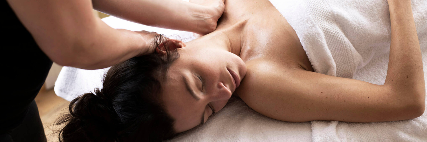 Woman laying down getting a relaxing massage