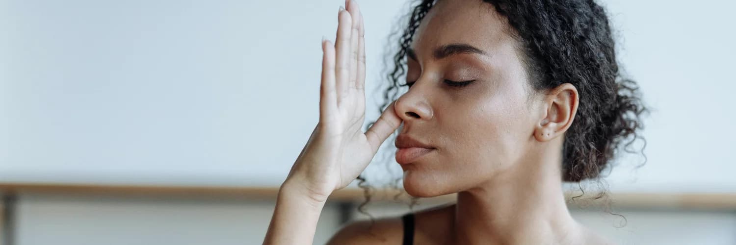 Woman practicing breathing techniques