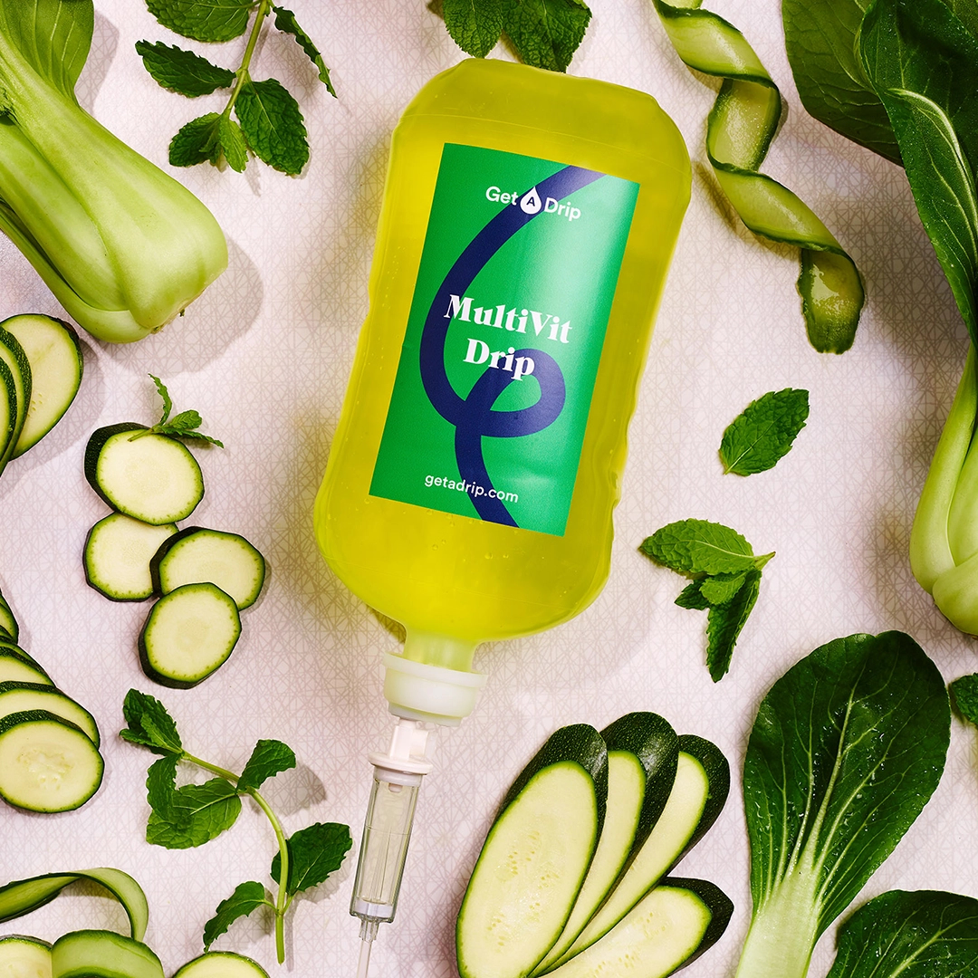 get a drip's multivitamin drip surrounded by courgettes, mint leaves and bok choi