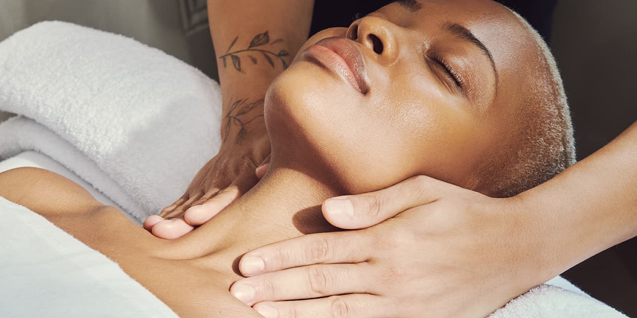 Woman laying down enjoying a massage