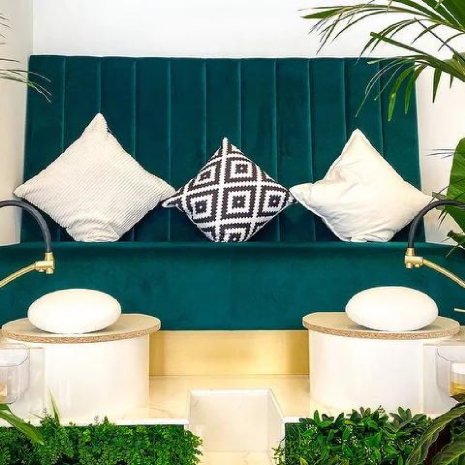 Best nail salon in London surrounded with greenery and plants and a sofa at Details in Barbican