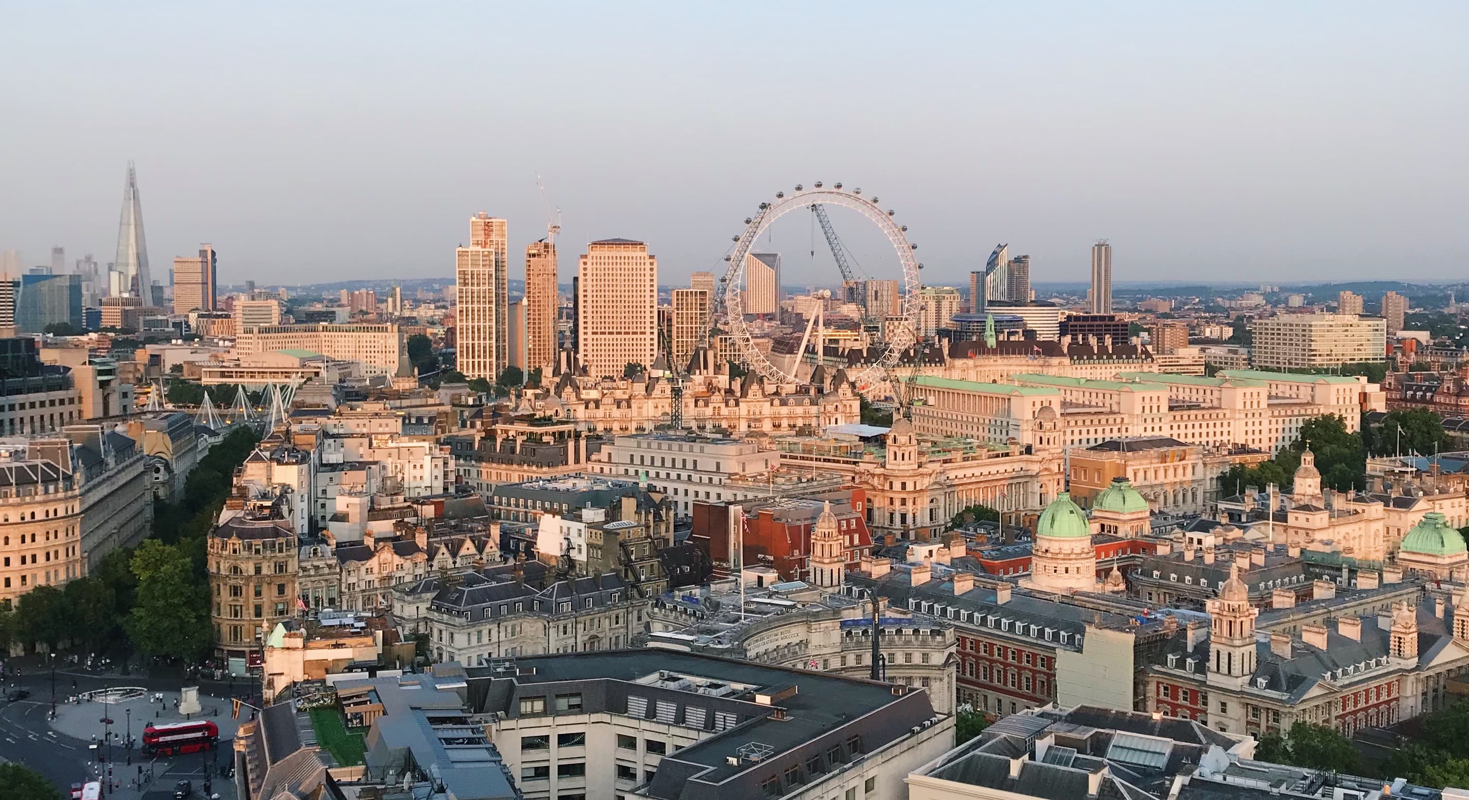 London skyline viewed from above including the London Eye, the Shard and Trafalgar Square